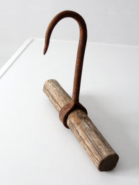 antique ice hook with wood handle