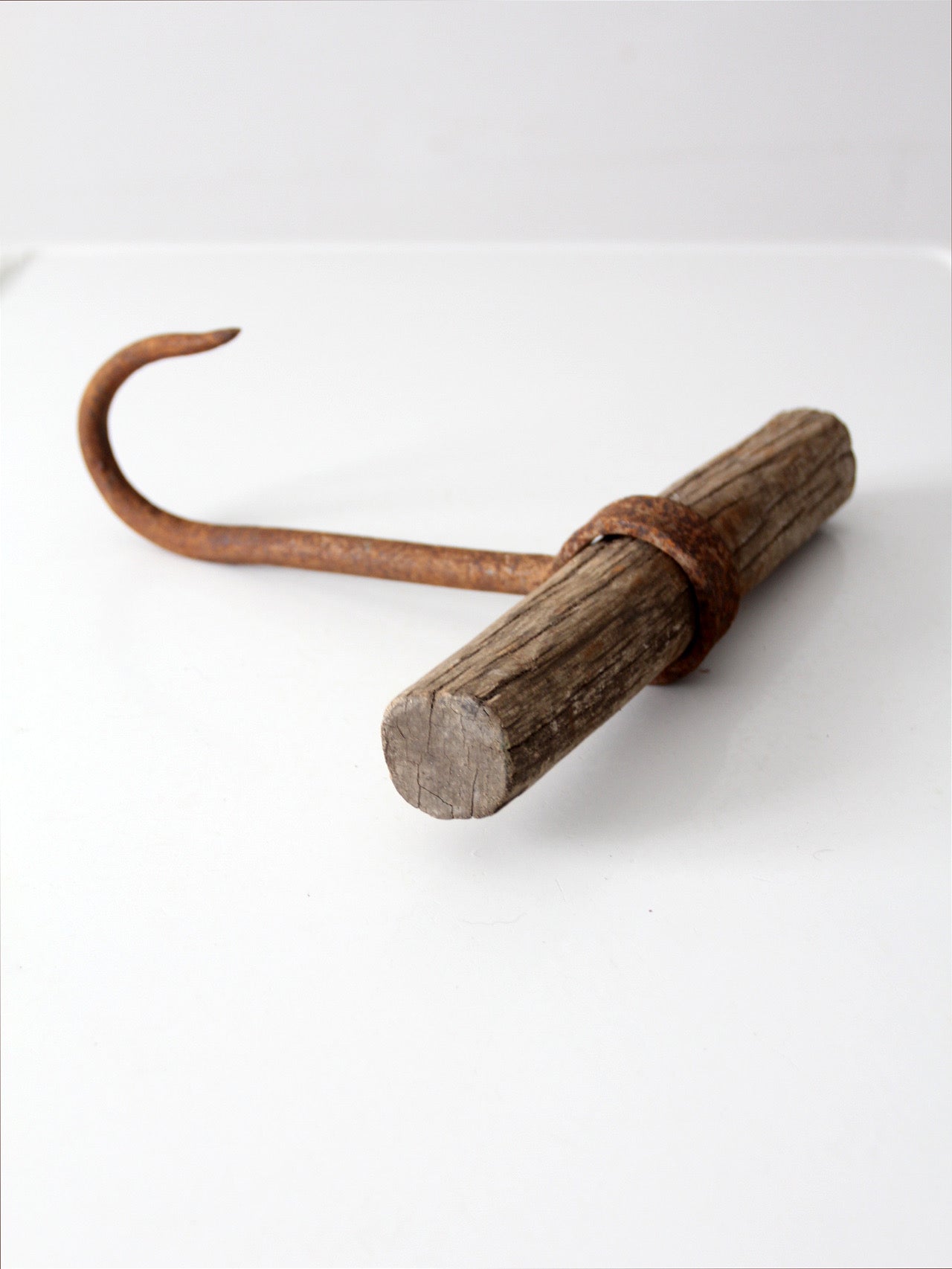 antique ice hook with wood handle