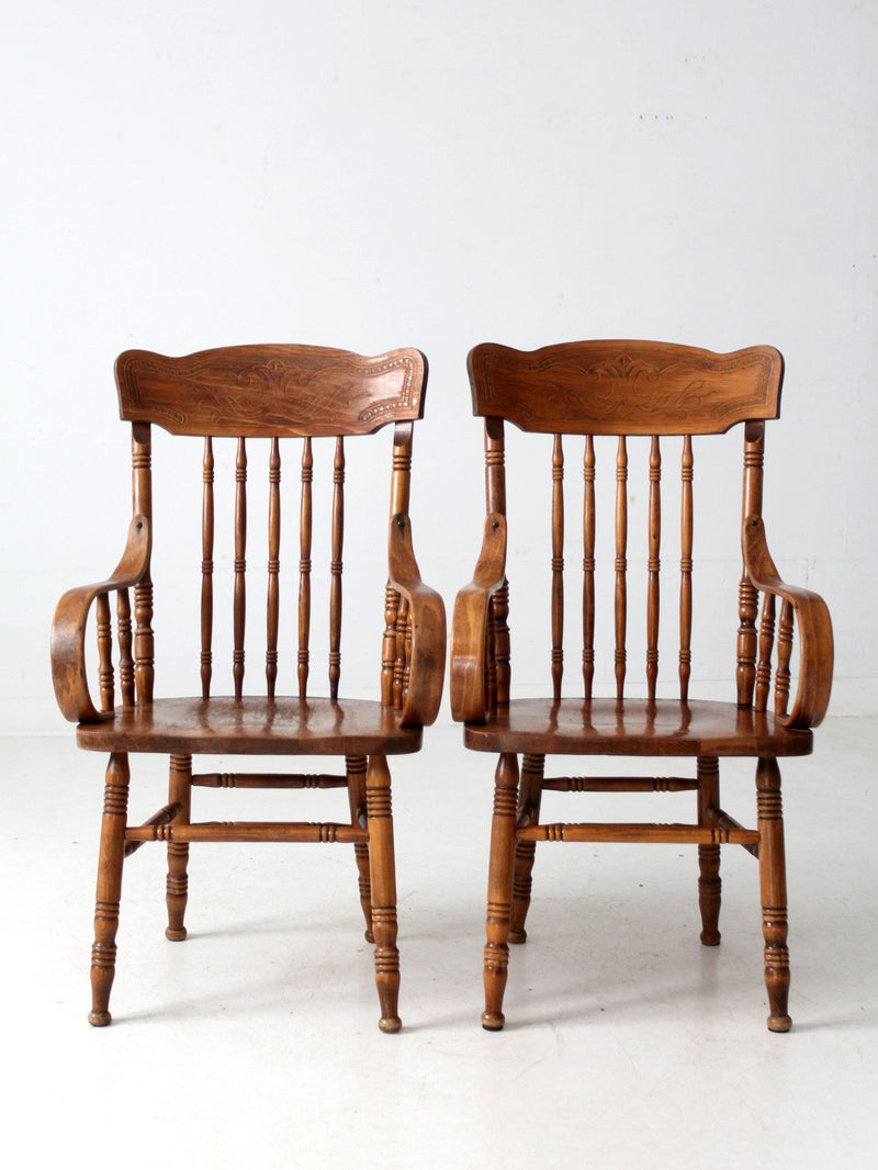 pair of vintage press-back back armchairs