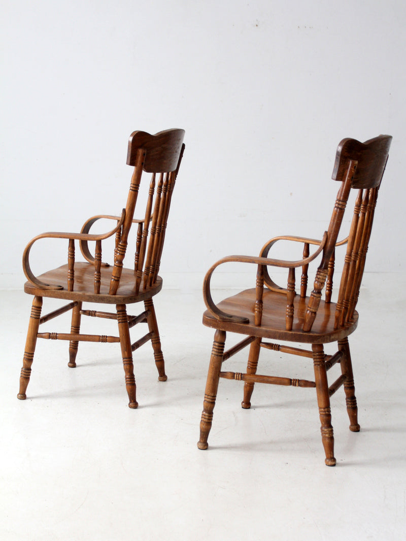 pair of vintage press-back back armchairs