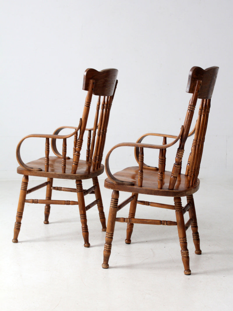pair of vintage press-back back armchairs