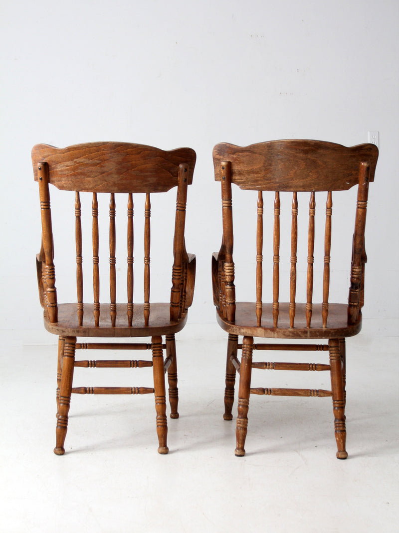 pair of vintage press-back back armchairs