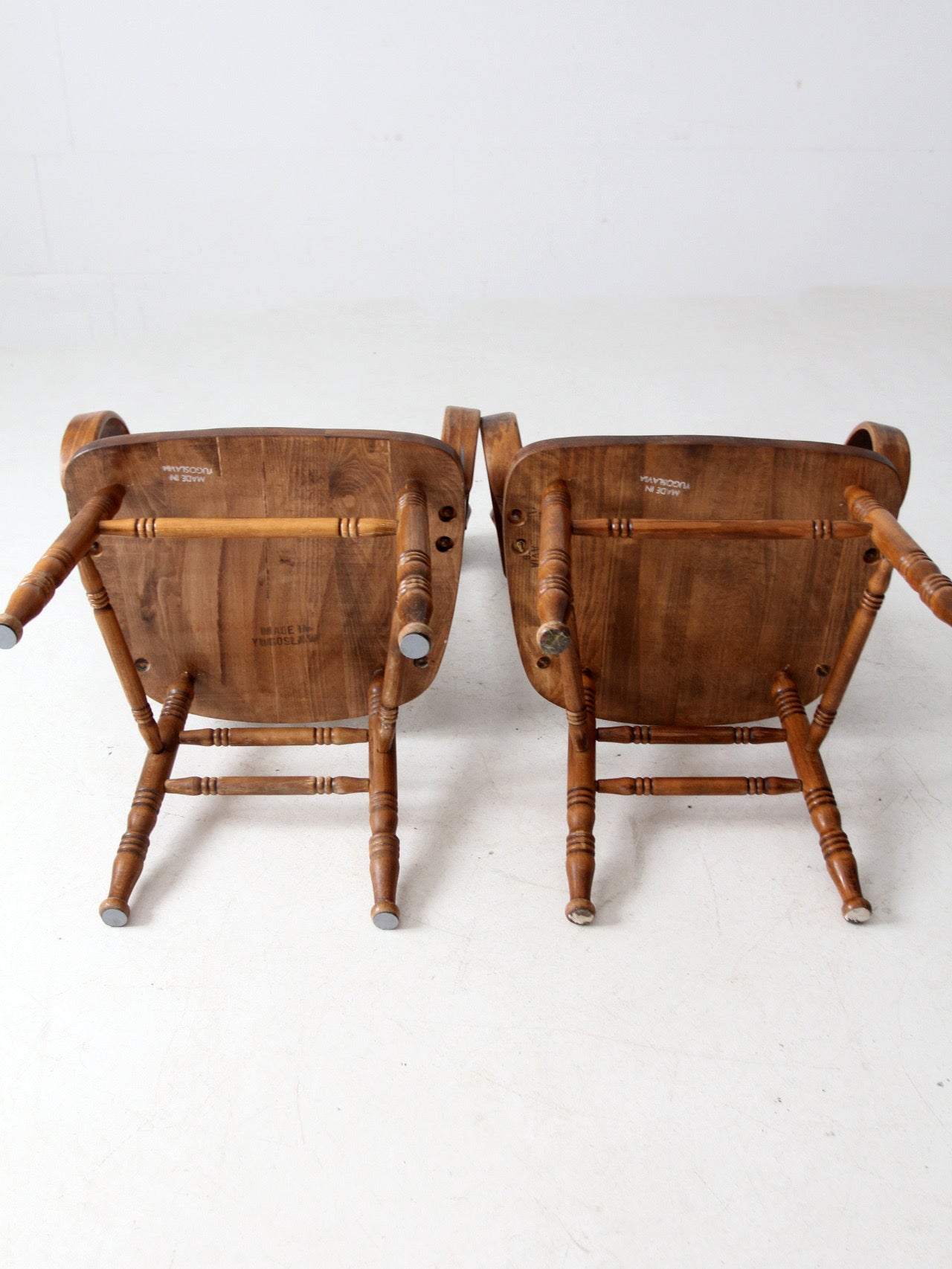 pair of vintage press-back back armchairs