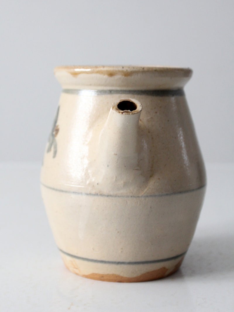 vintage studio pottery pitcher with lid