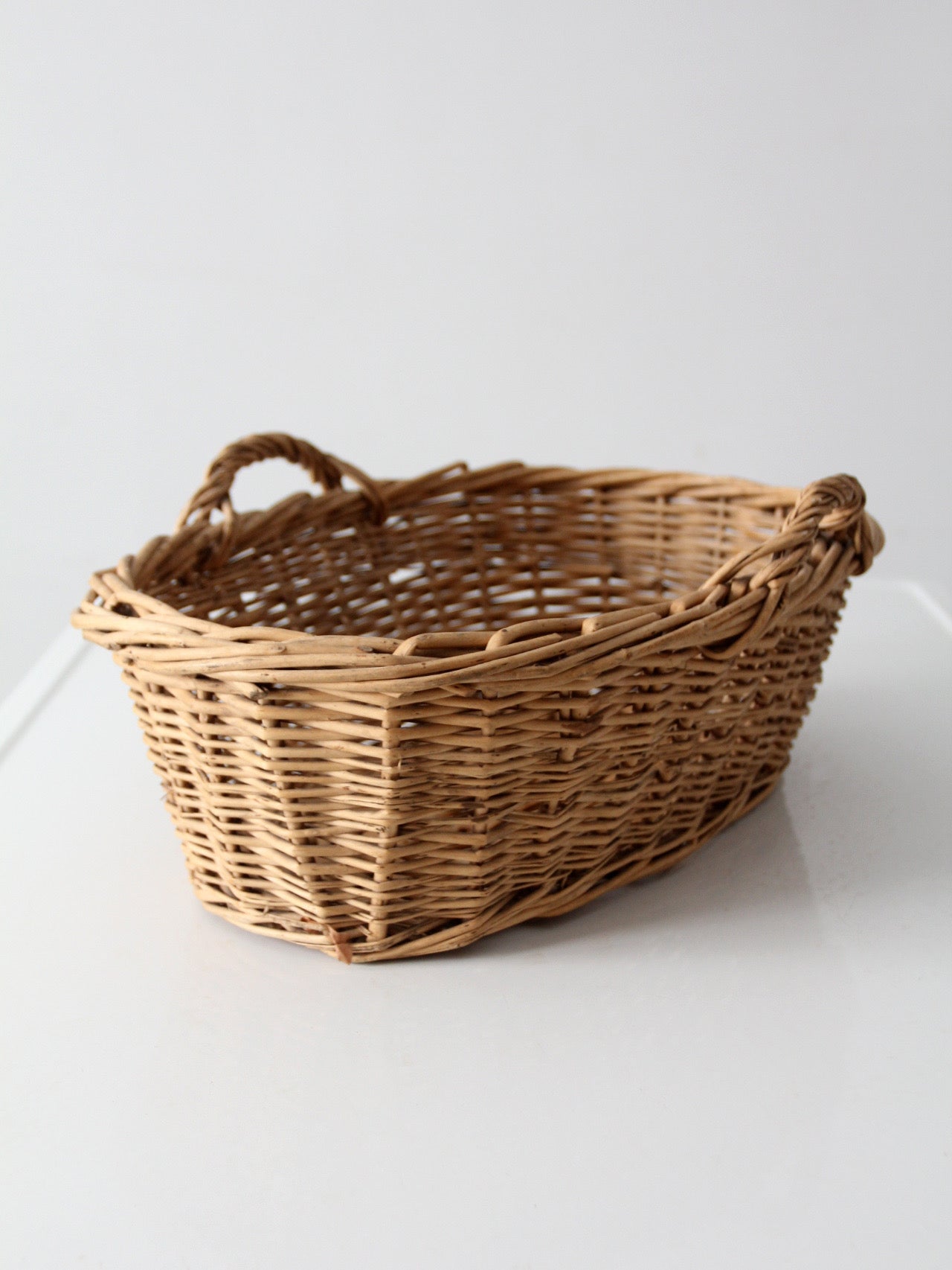 vintage wicker gathering basket with handles