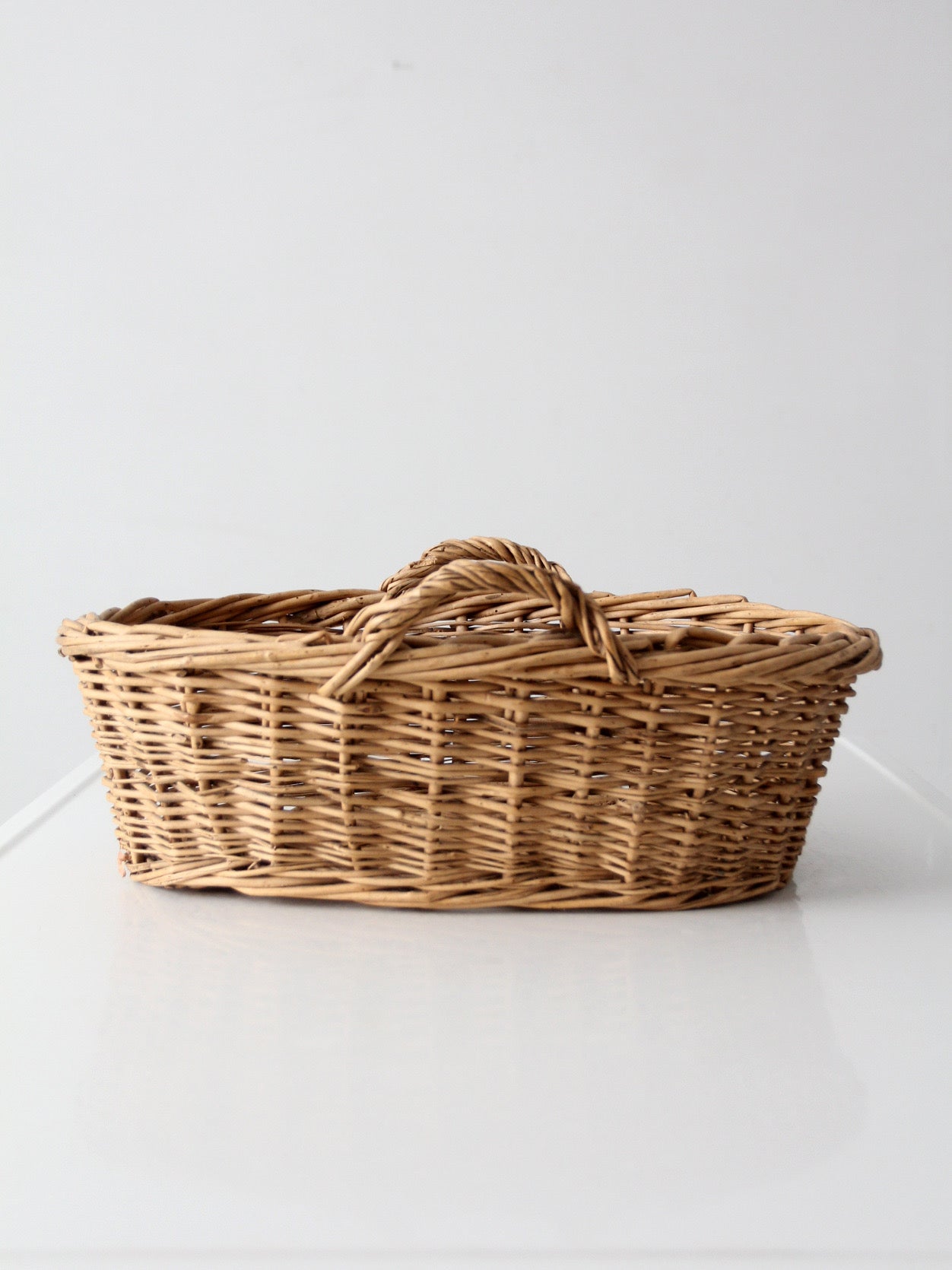vintage wicker gathering basket with handles