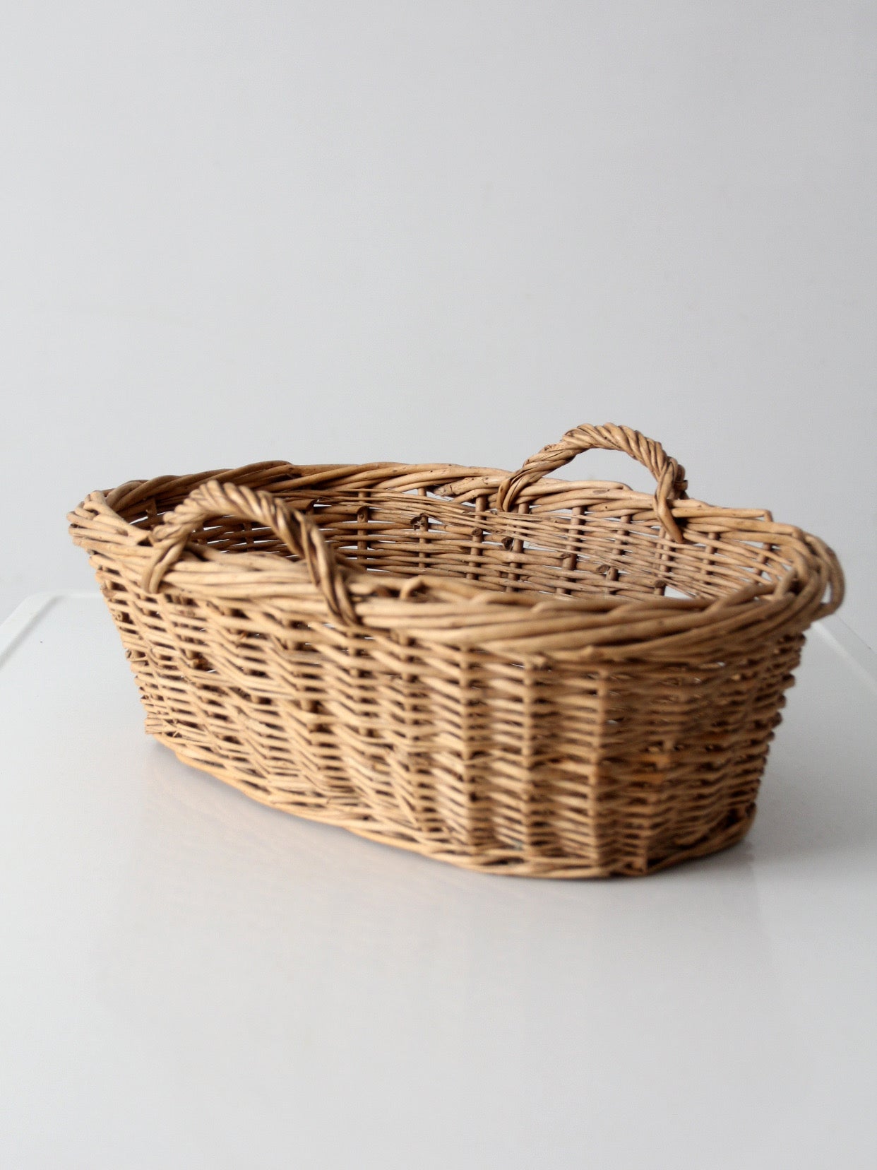 vintage wicker gathering basket with handles