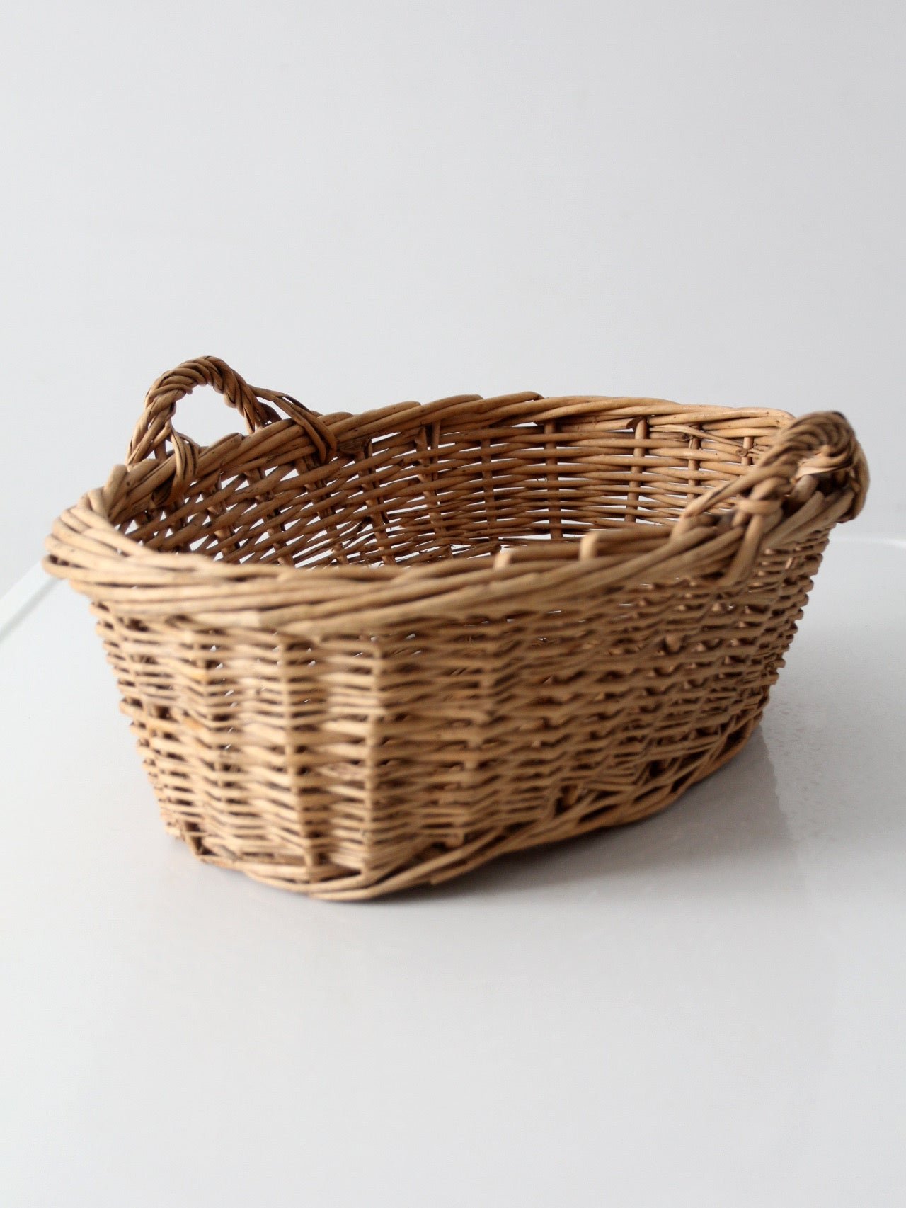 vintage wicker gathering basket with handles