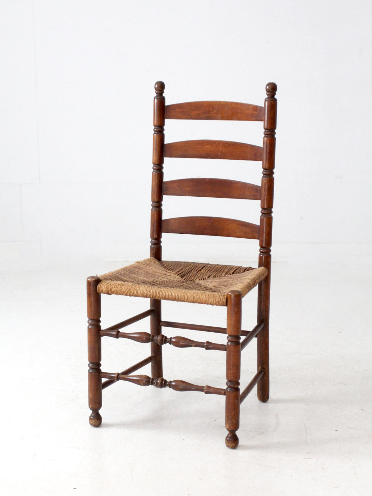 antique rush seat ladder back chair