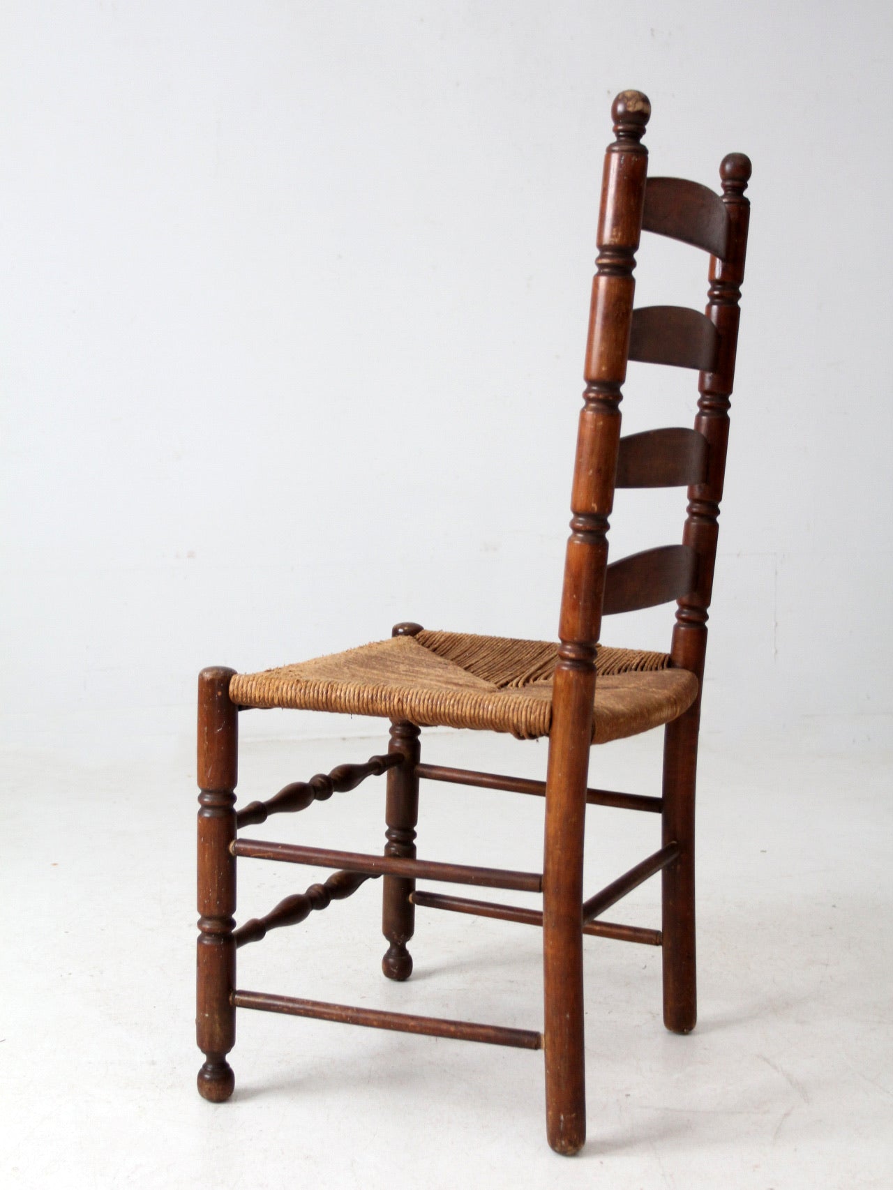 antique rush seat ladder back chair