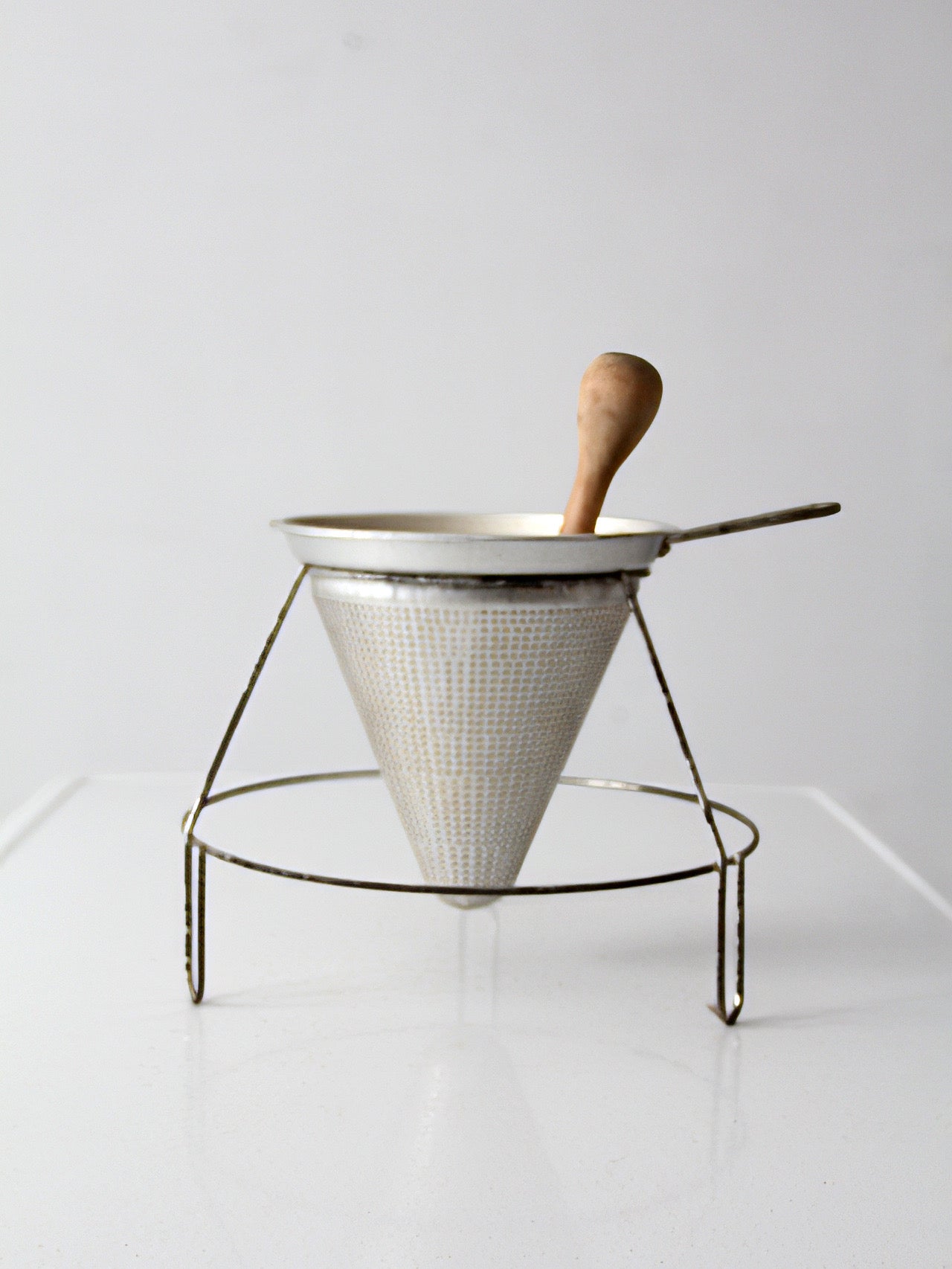 mid-century conical strainer set