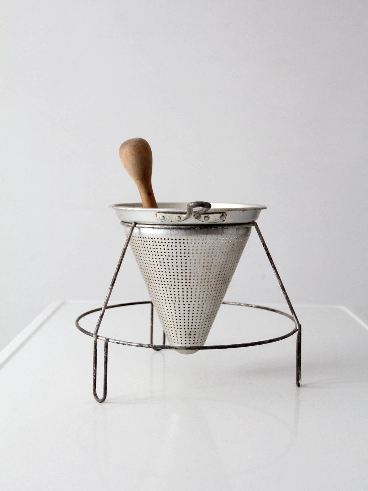 mid-century conical strainer set