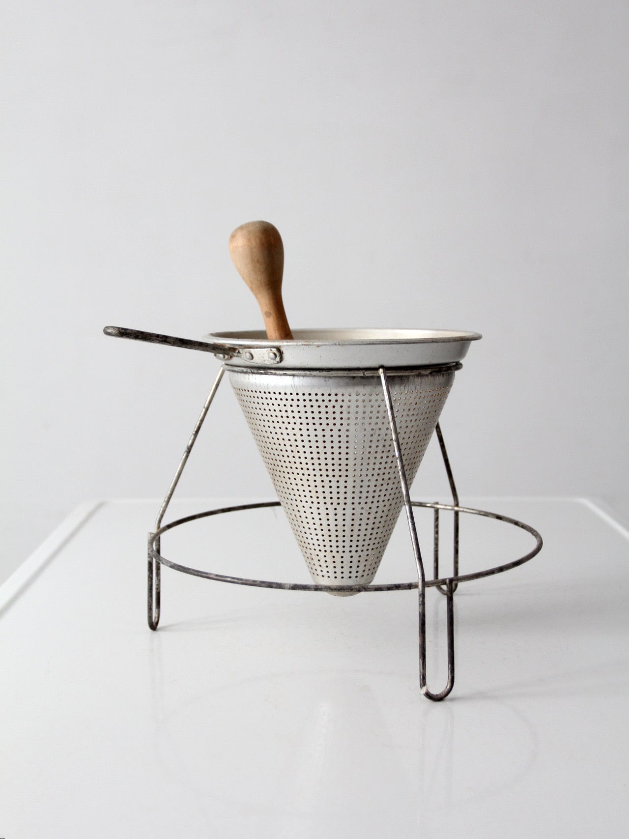 mid-century conical strainer set