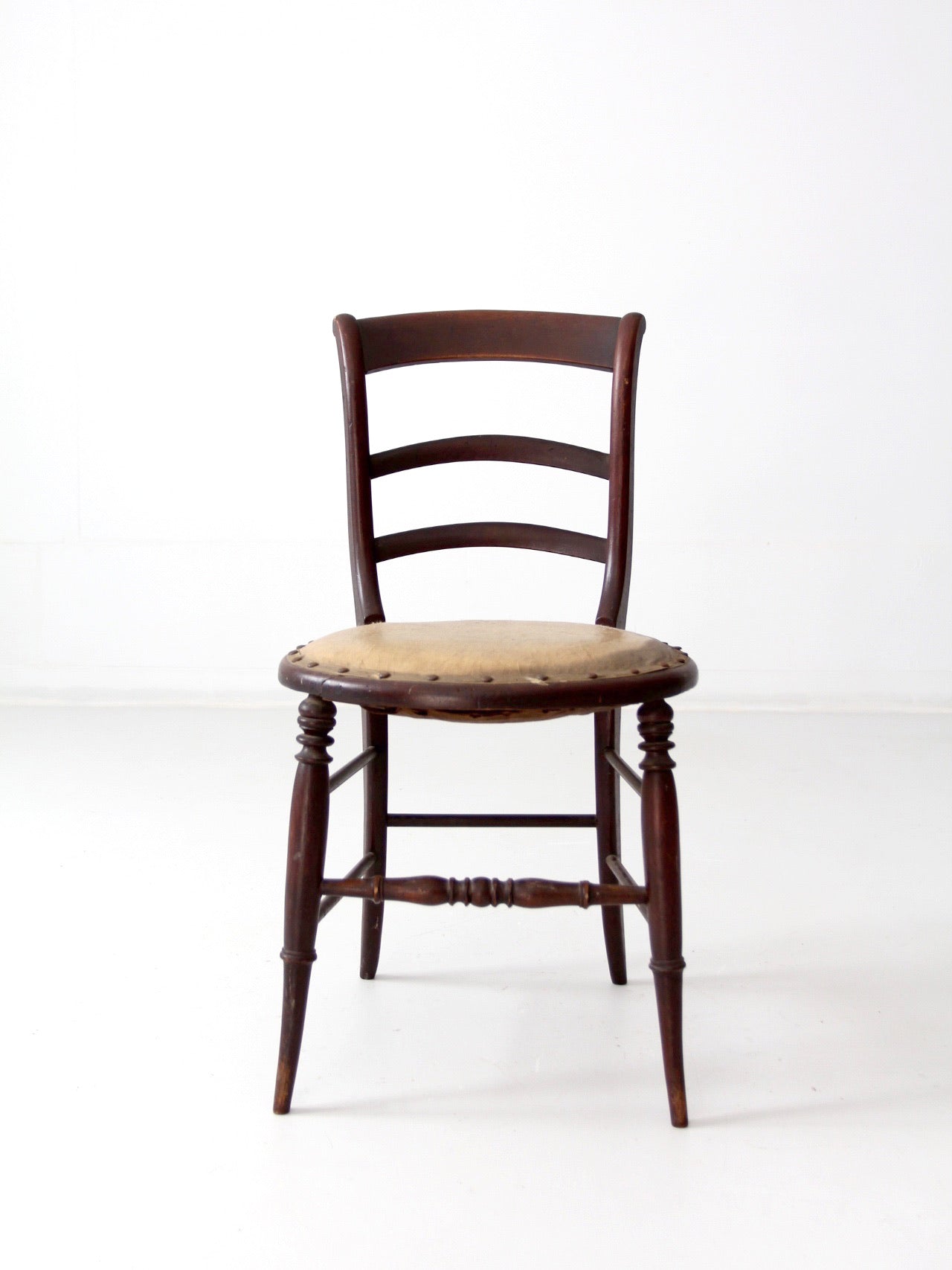 antique ladder back chair with upholstered seat