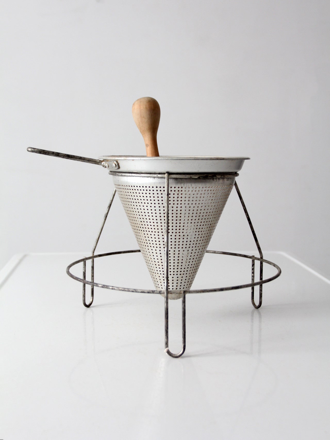 mid-century conical strainer set