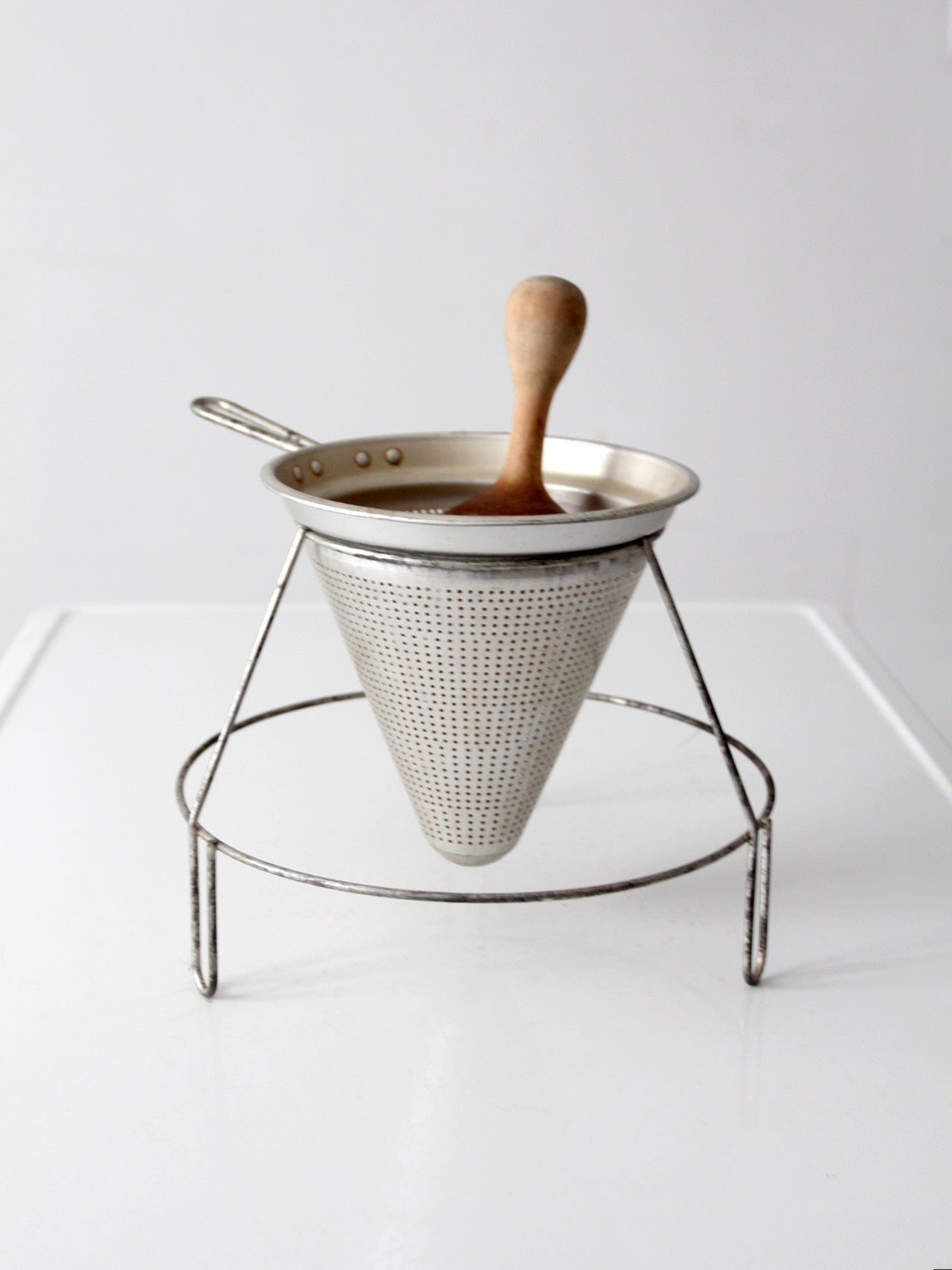 mid-century conical strainer set