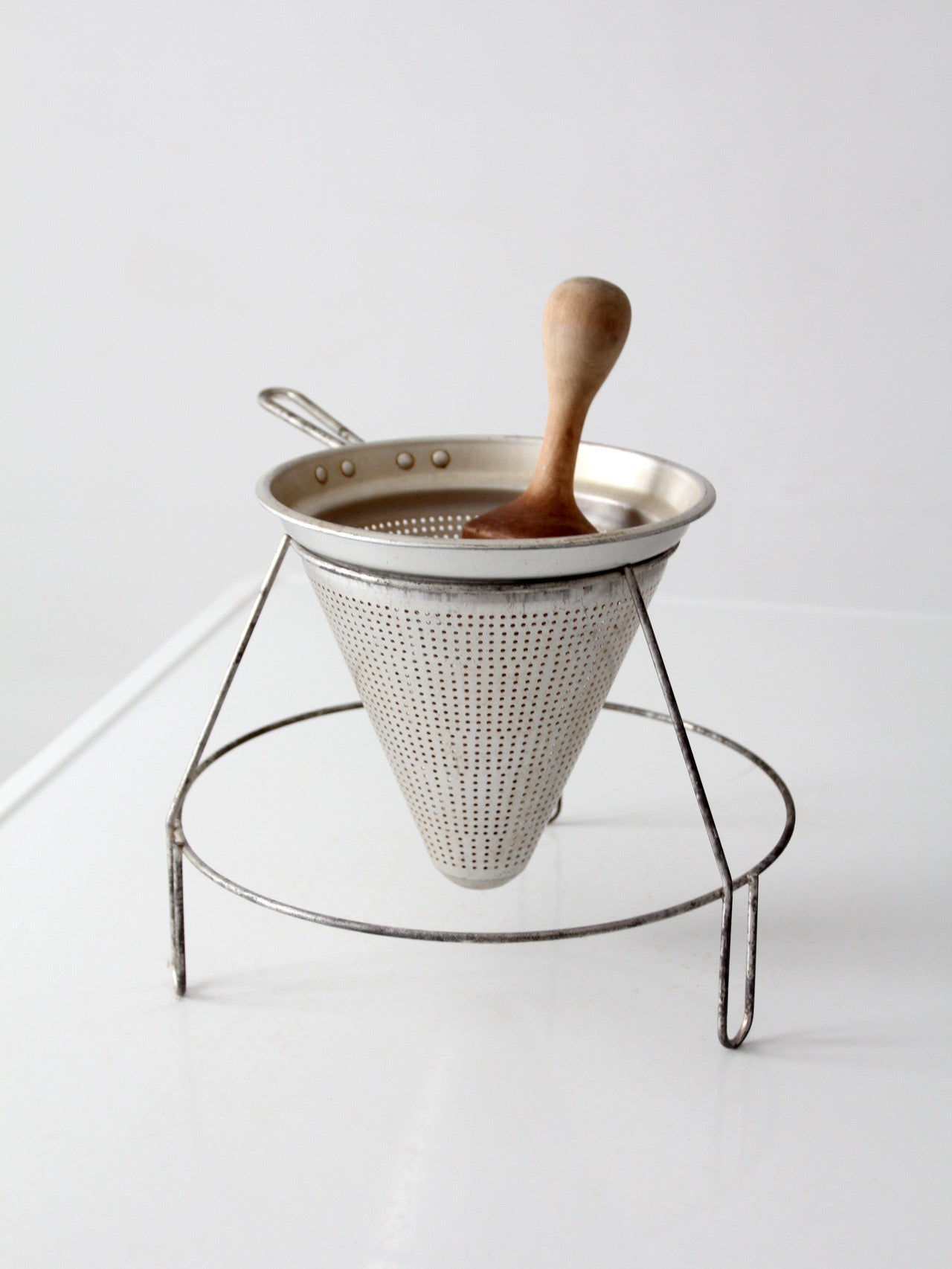 mid-century conical strainer set