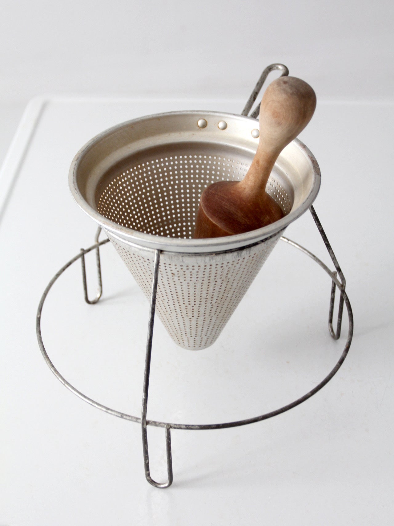 mid-century conical strainer set