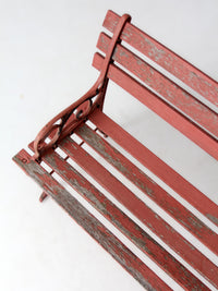 vintage red iron and wood garden bench
