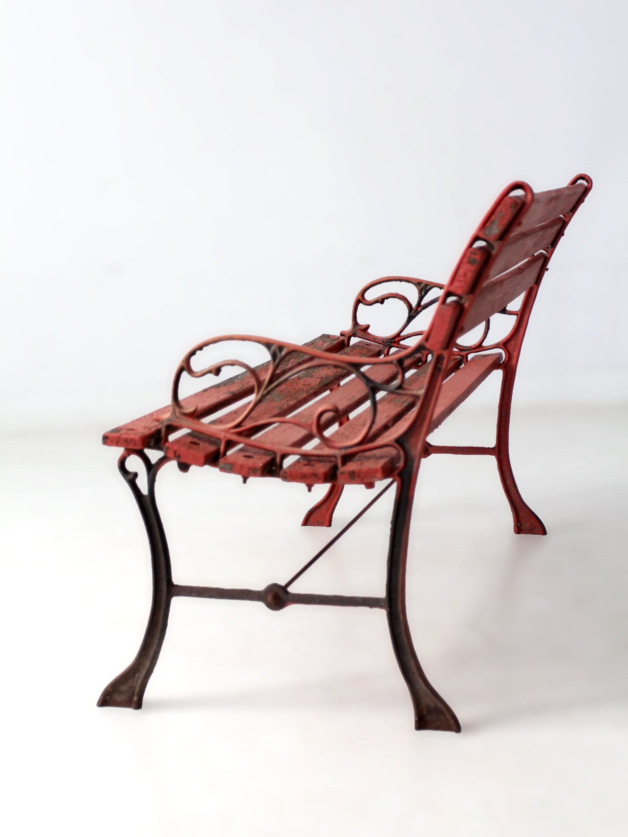 vintage red iron and wood garden bench