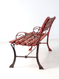 vintage red iron and wood garden bench