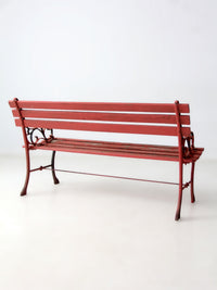 vintage red iron and wood garden bench