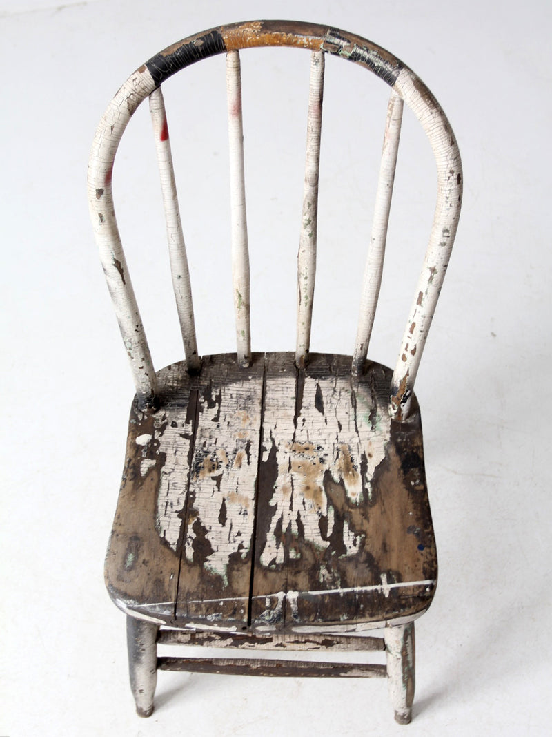 antique distressed white spindle back chair