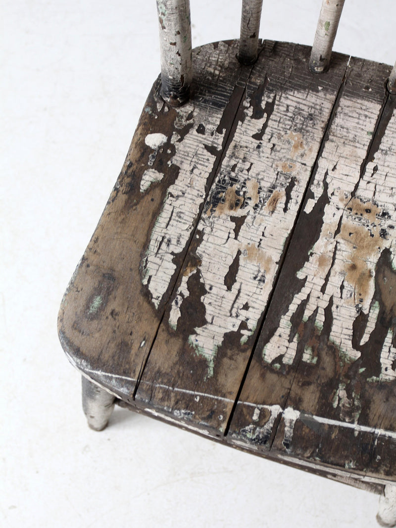 antique distressed white spindle back chair