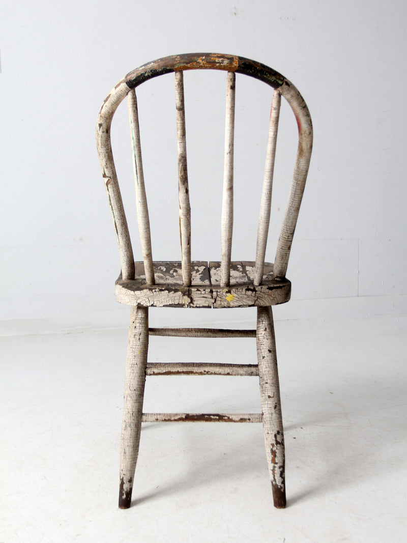 antique distressed white spindle back chair
