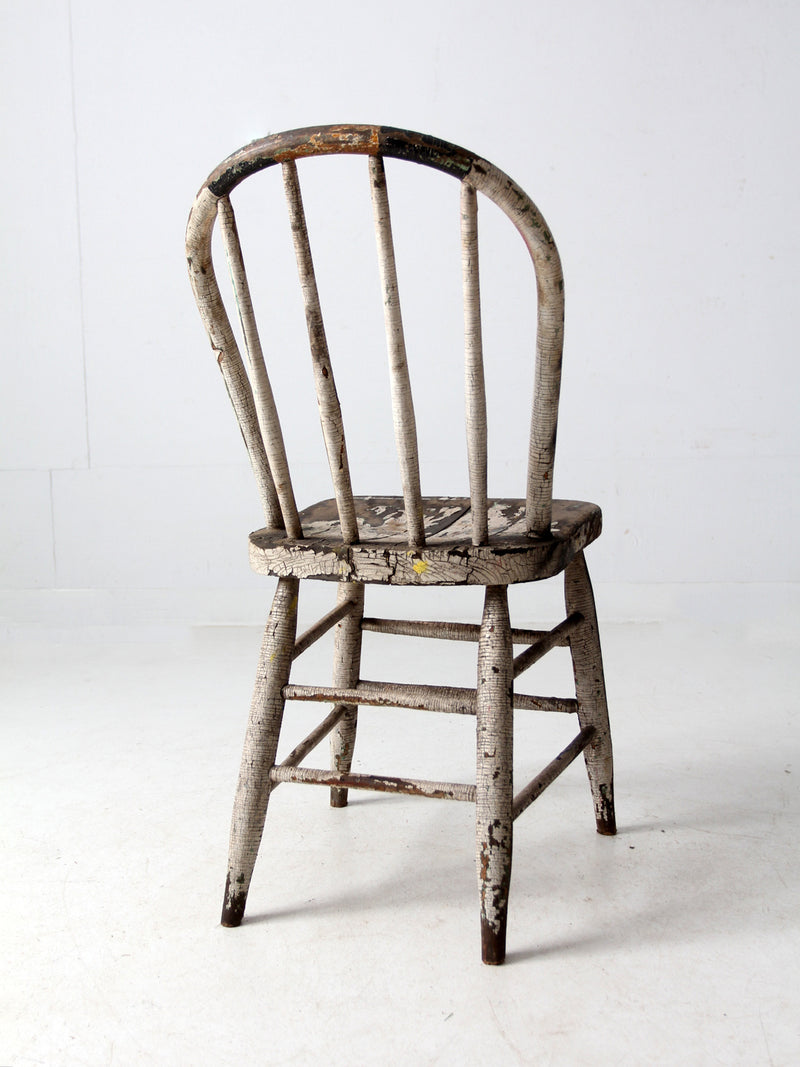 antique distressed white spindle back chair