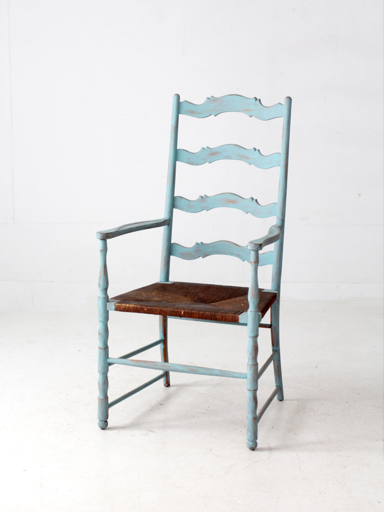 vintage painted ladder back chair with rush seat