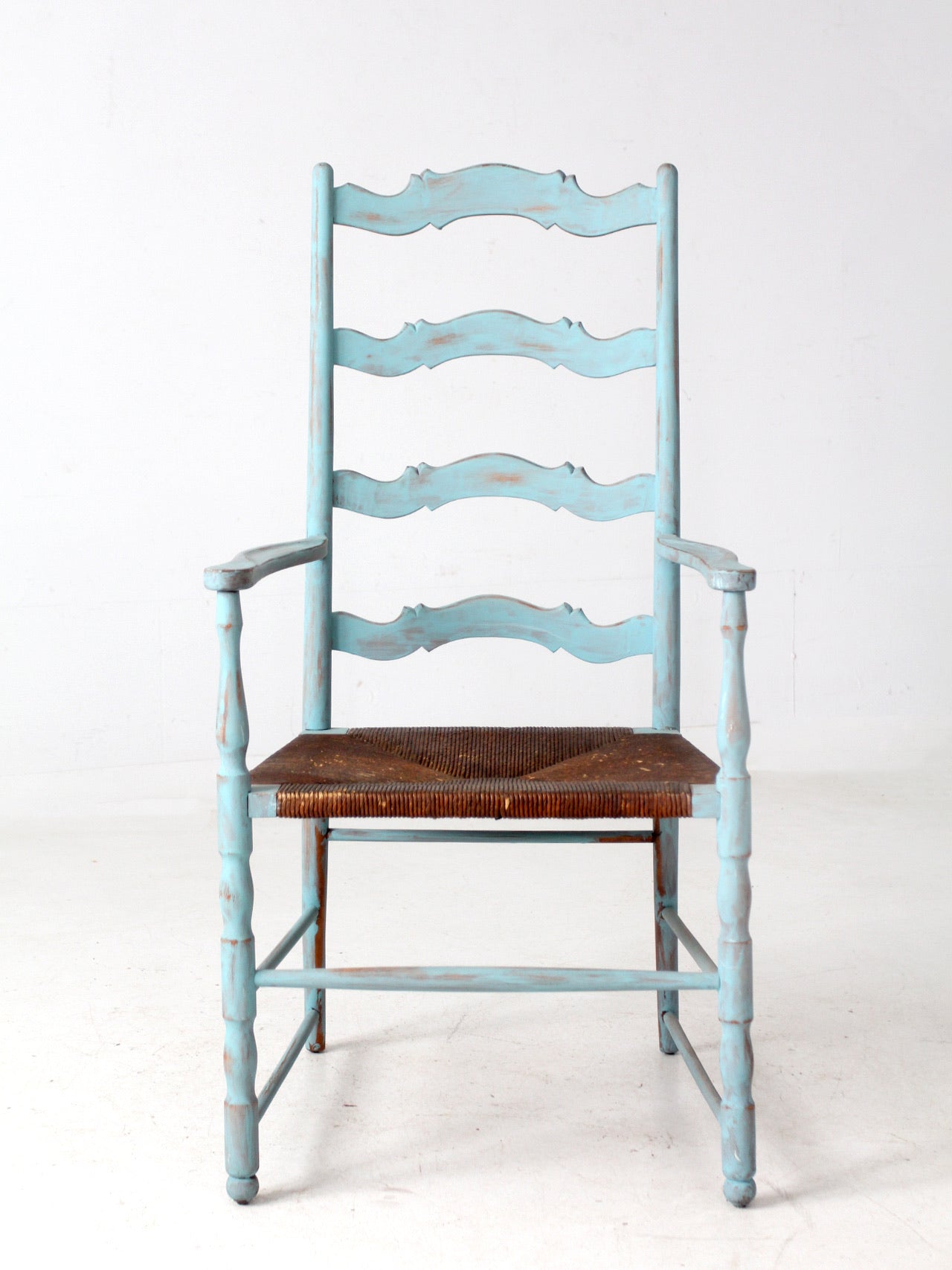 vintage painted ladder back chair with rush seat