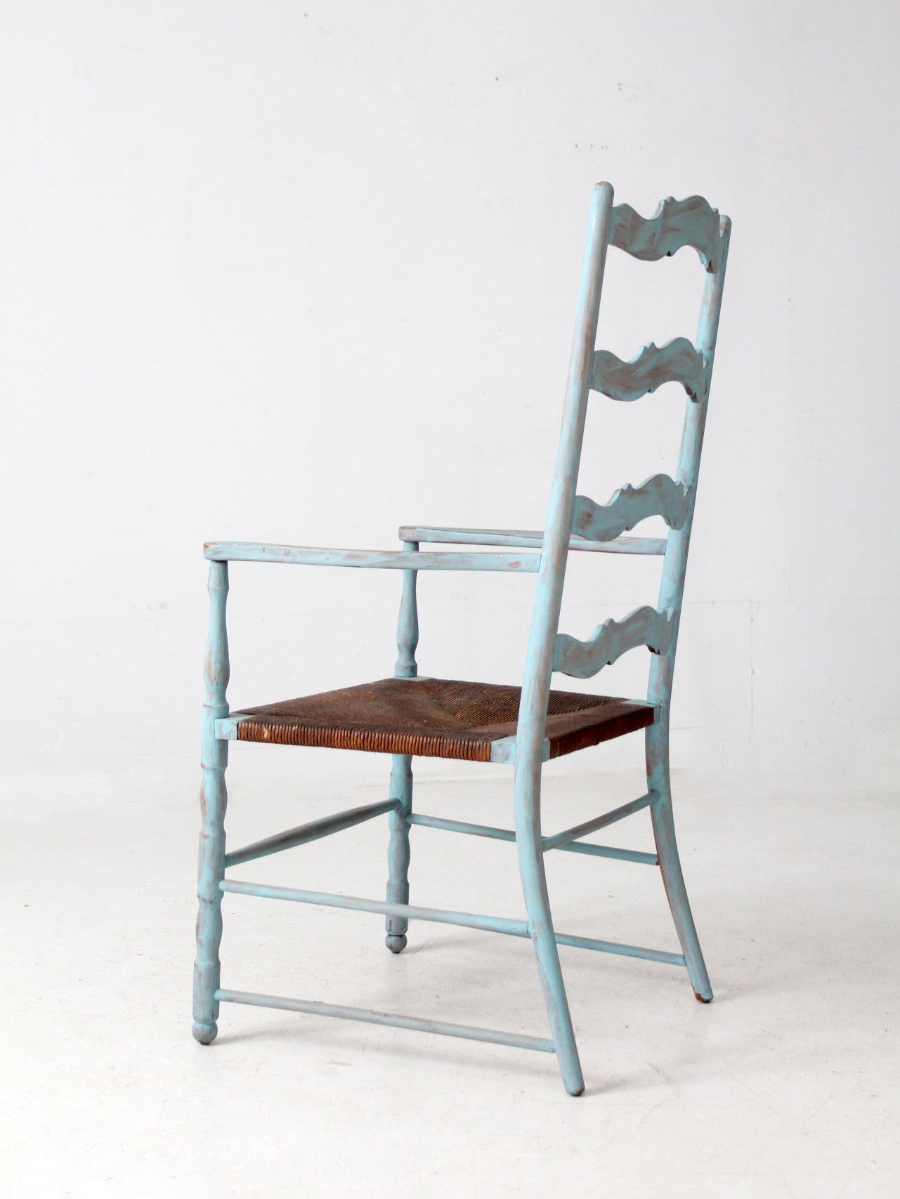 vintage painted ladder back chair with rush seat