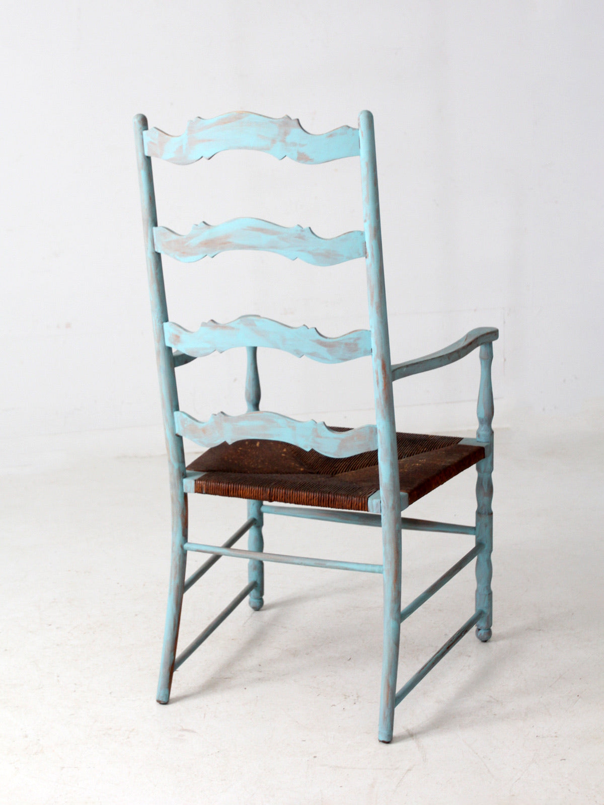 vintage painted ladder back chair with rush seat