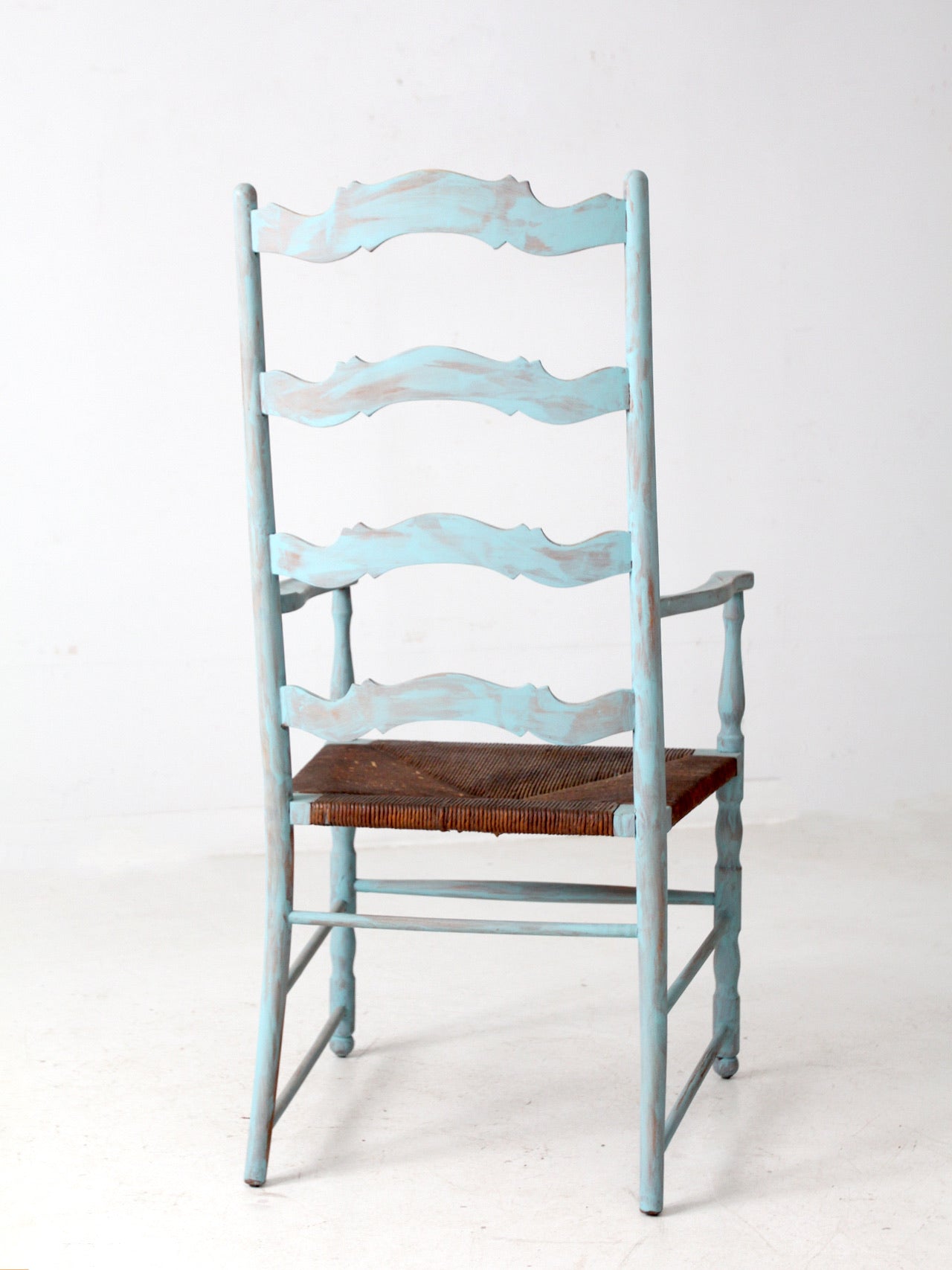 vintage painted ladder back chair with rush seat