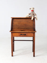 antique child's roll-top secretary desk