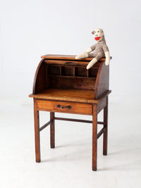 antique child's roll-top secretary desk