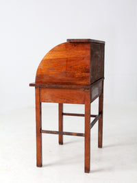antique child's roll-top secretary desk
