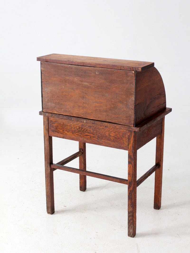 antique child's roll-top secretary desk
