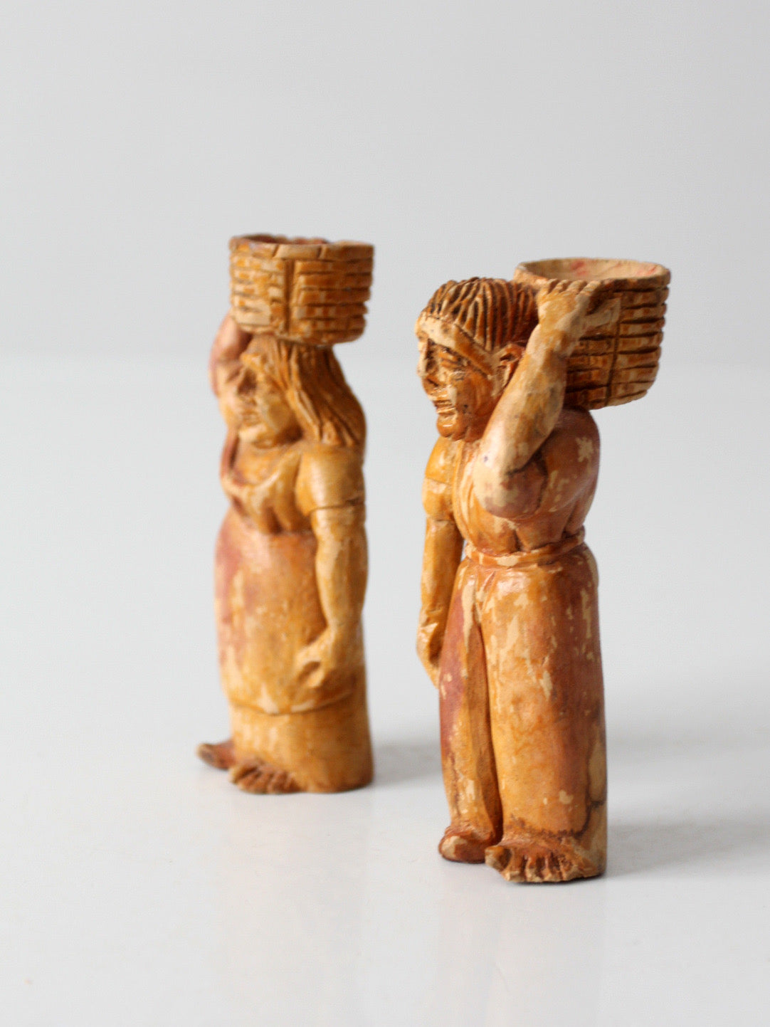 mid-century wood folk art basket carrying figures