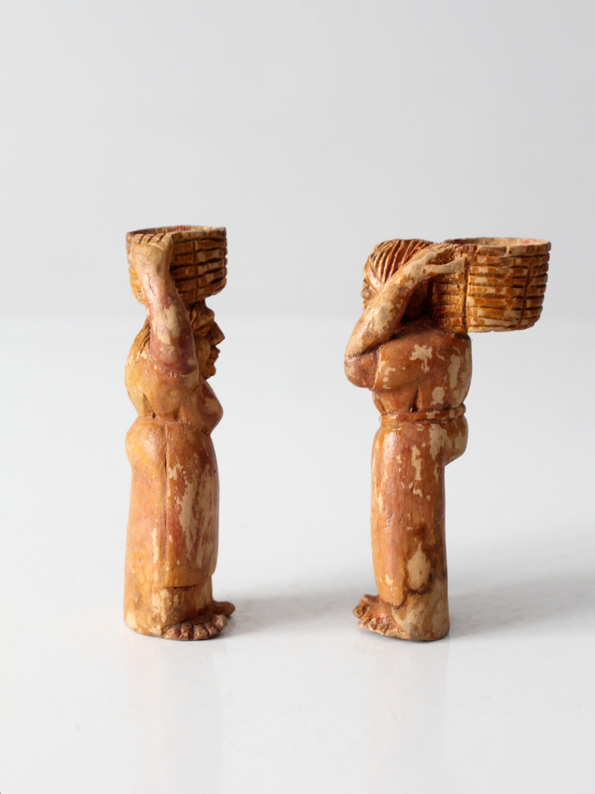 mid-century wood folk art basket carrying figures