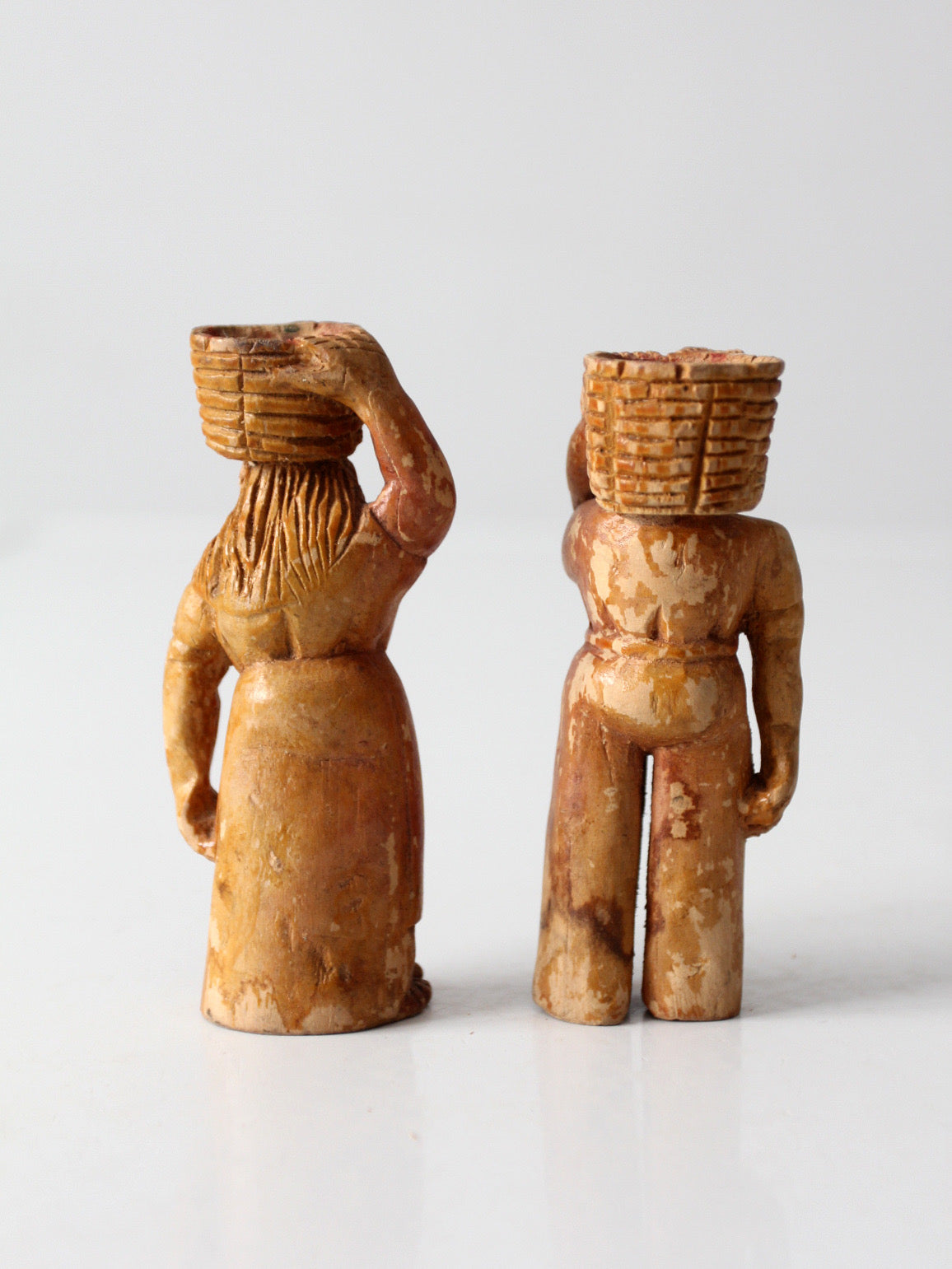 mid-century wood folk art basket carrying figures