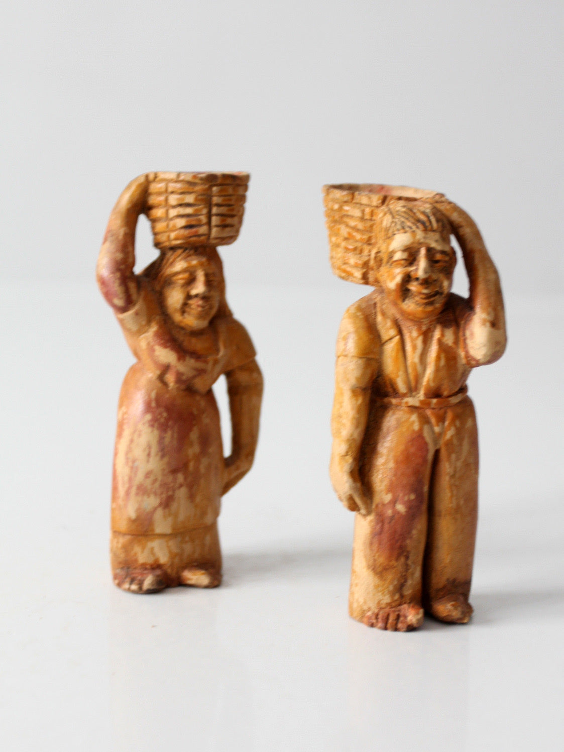 mid-century wood folk art basket carrying figures