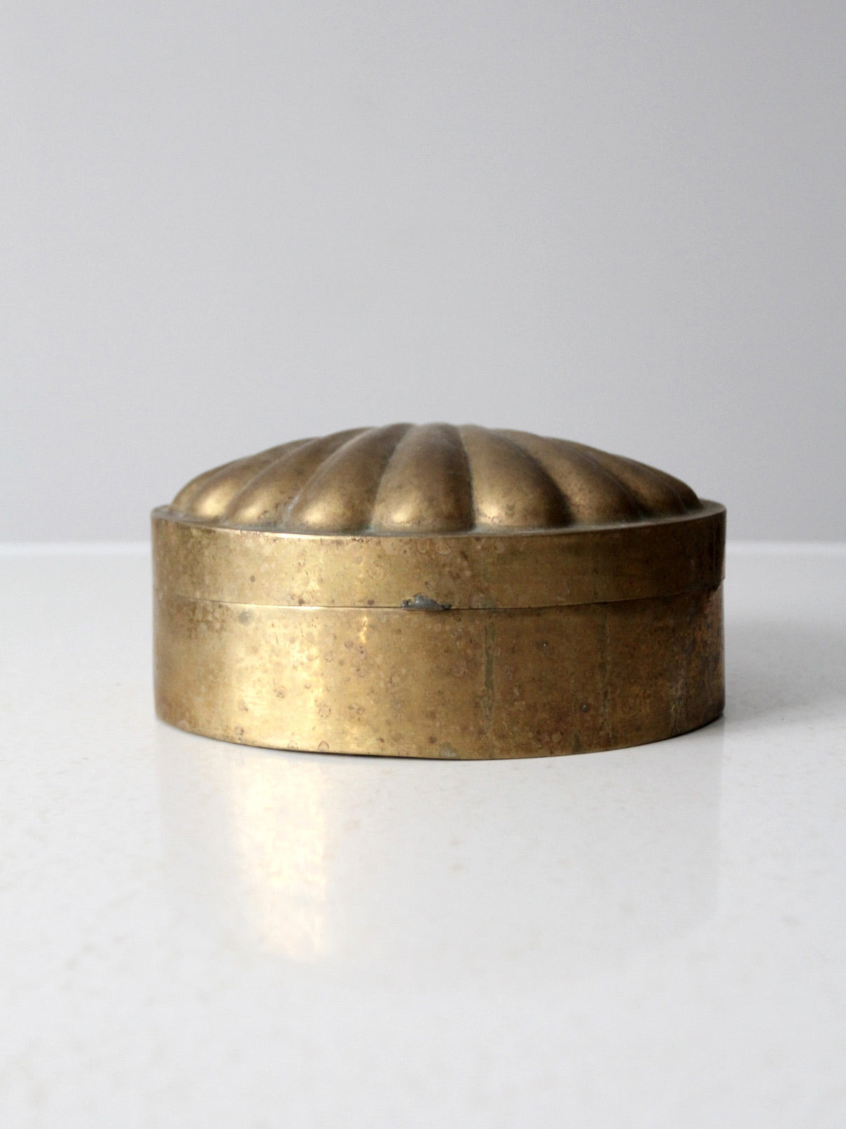 mid-century brass seashell shaped box