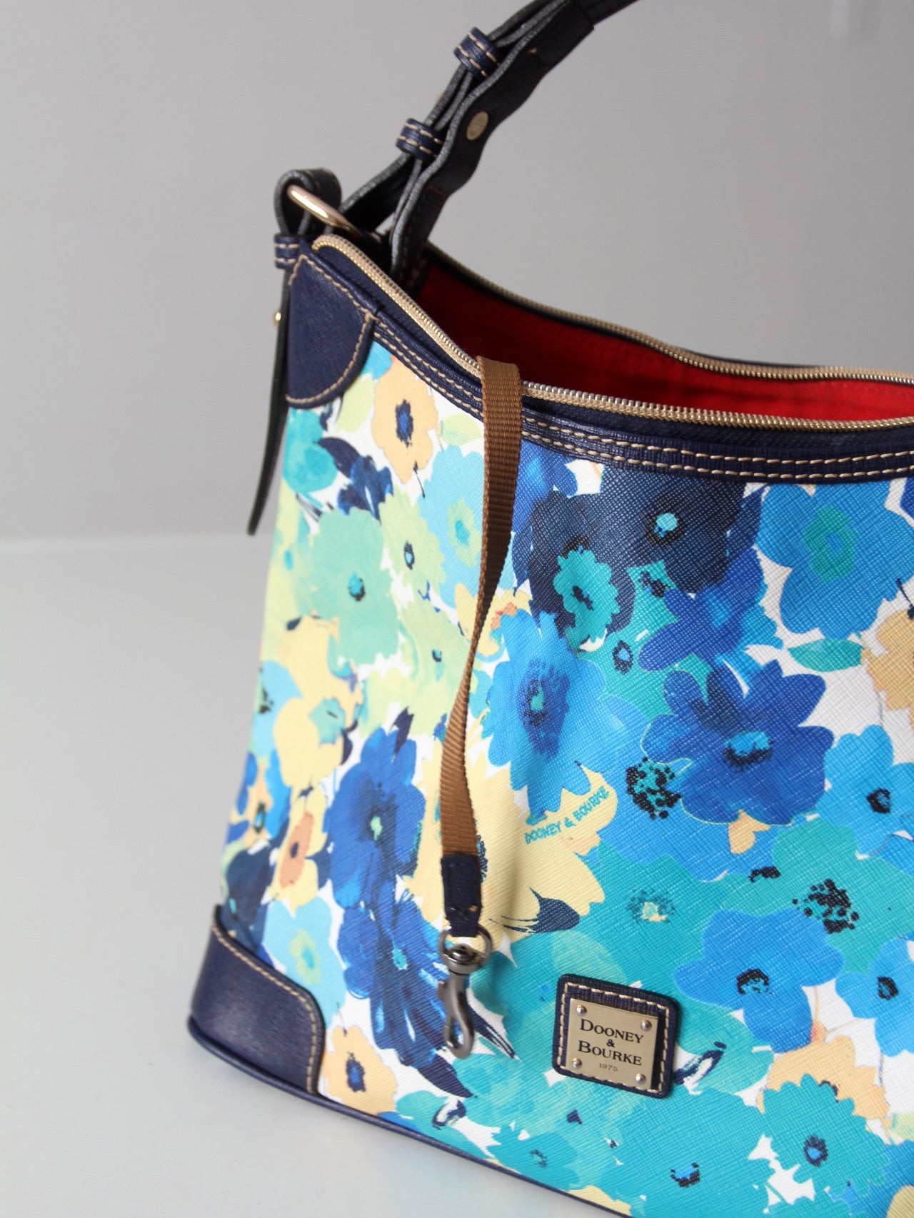 Dooney & Bourke floral coated canvas