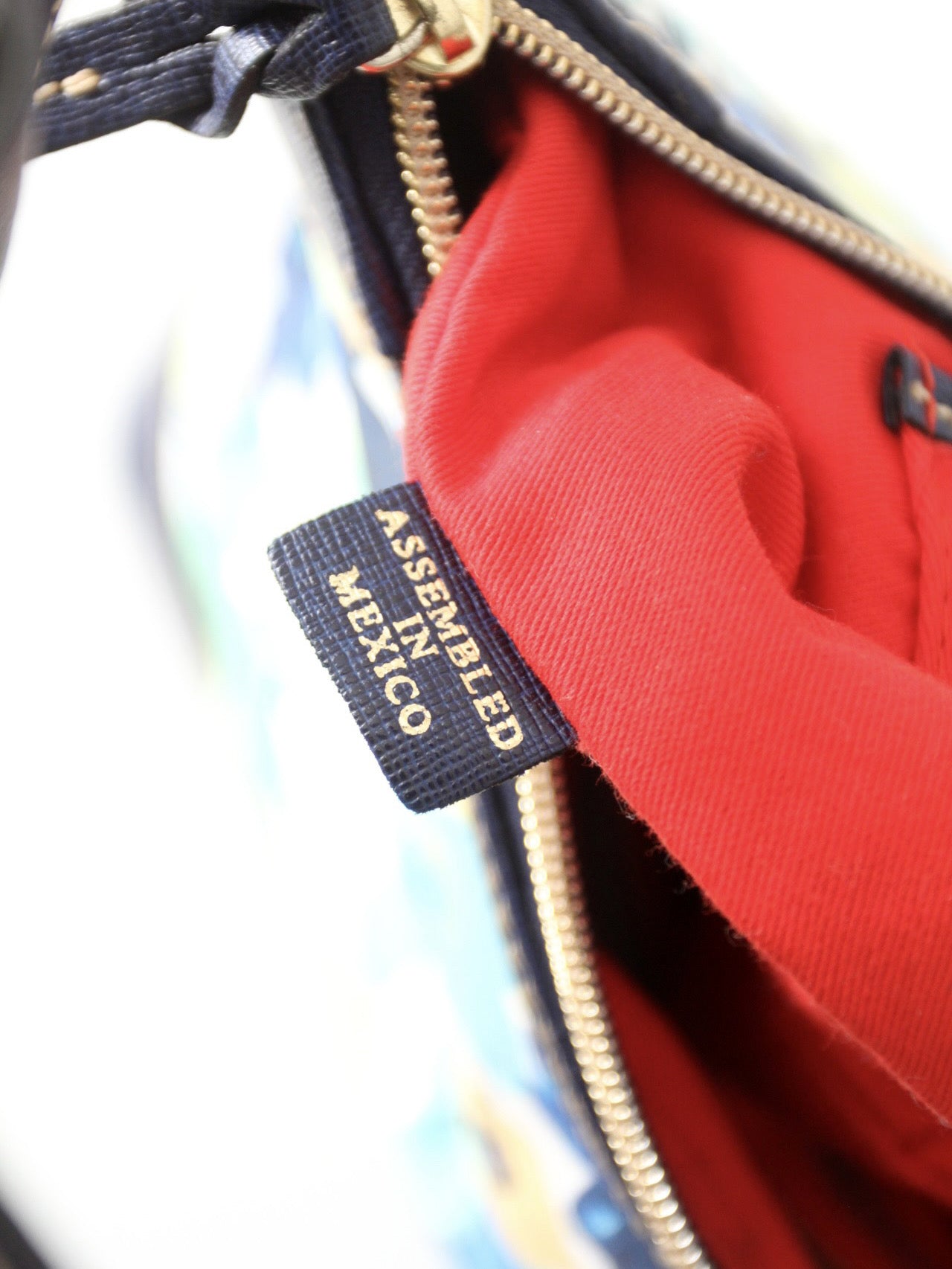 Dooney & Bourke floral coated canvas