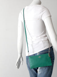 Coach green leather crossbody pouch with chain strap
