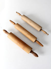 set of antique rolling pins
