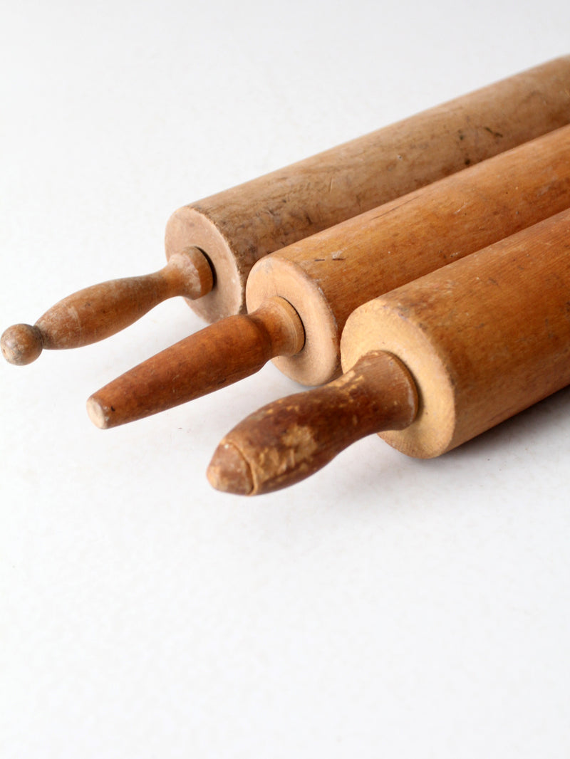 set of antique rolling pins