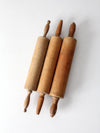set of antique rolling pins